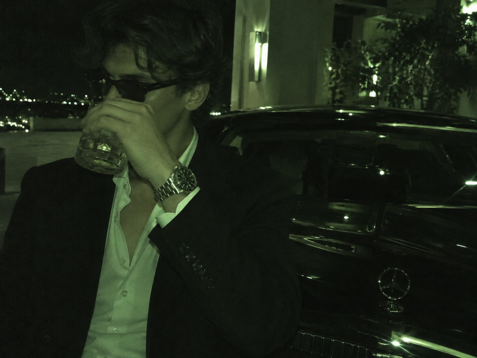Steel diver on the wrist of a man in a dark suit